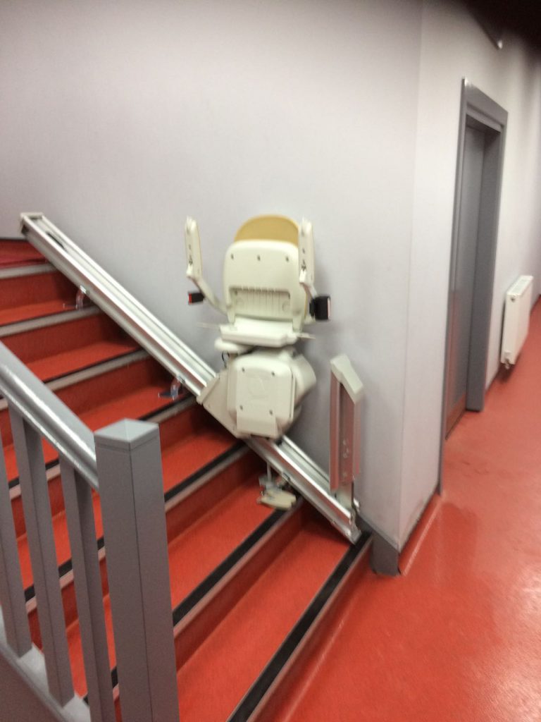 Water Proof Acorn Brooks Stairlift After Installation in Commercial Setting